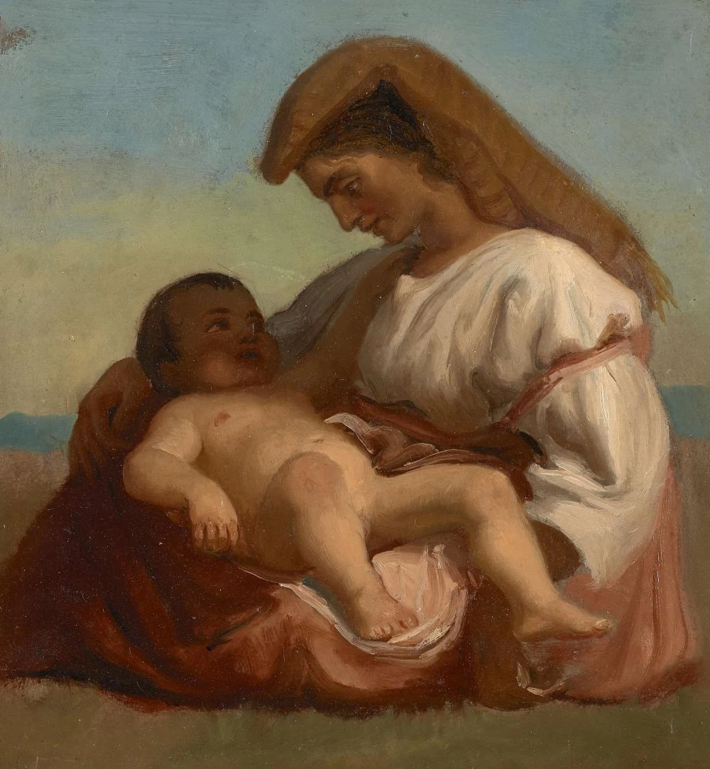 Giovane donna italiana che tiene in braccio il suo bambino